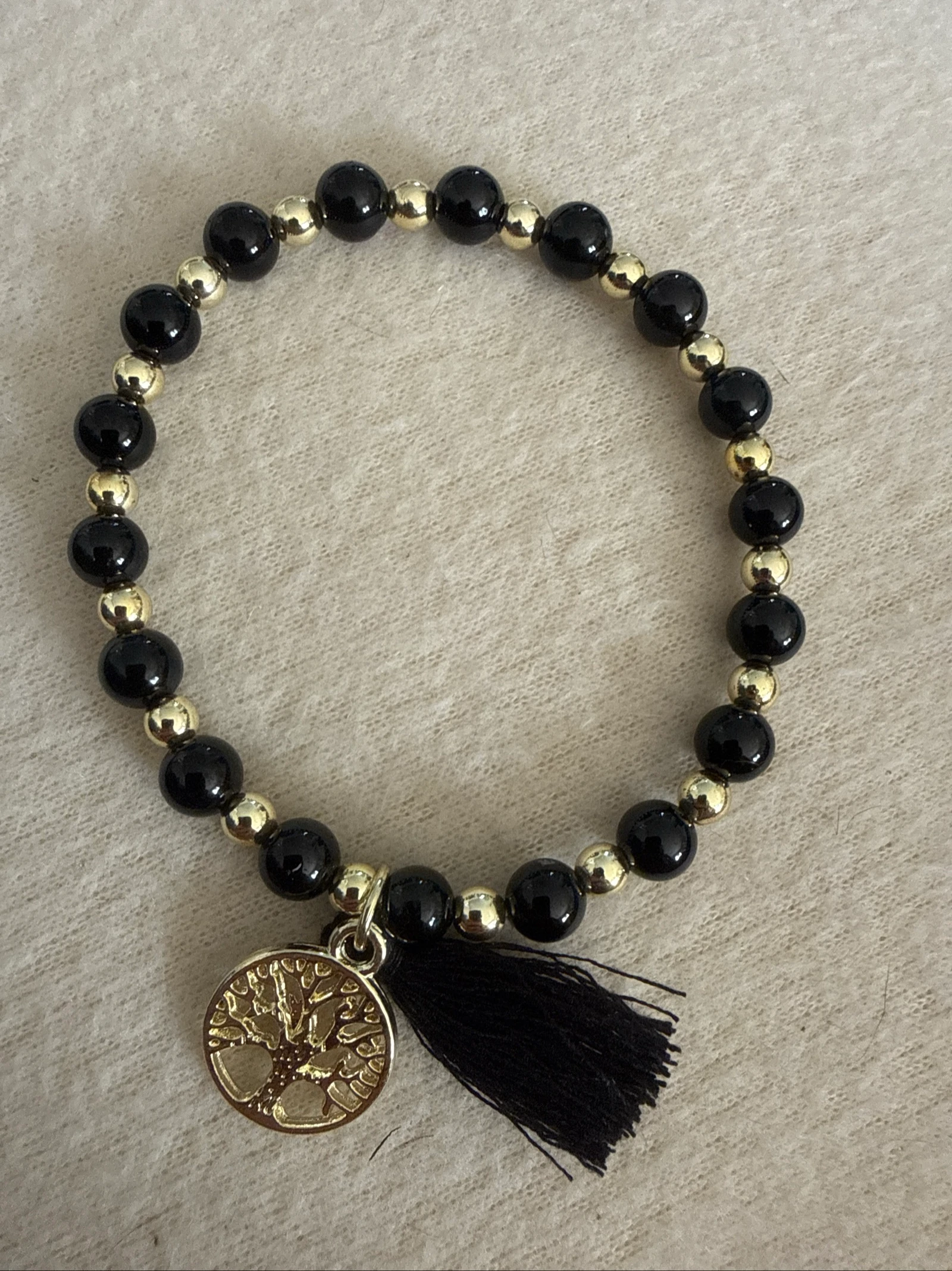 Bracelet tourmaline noire et hématite avec arbre de vie et pompon